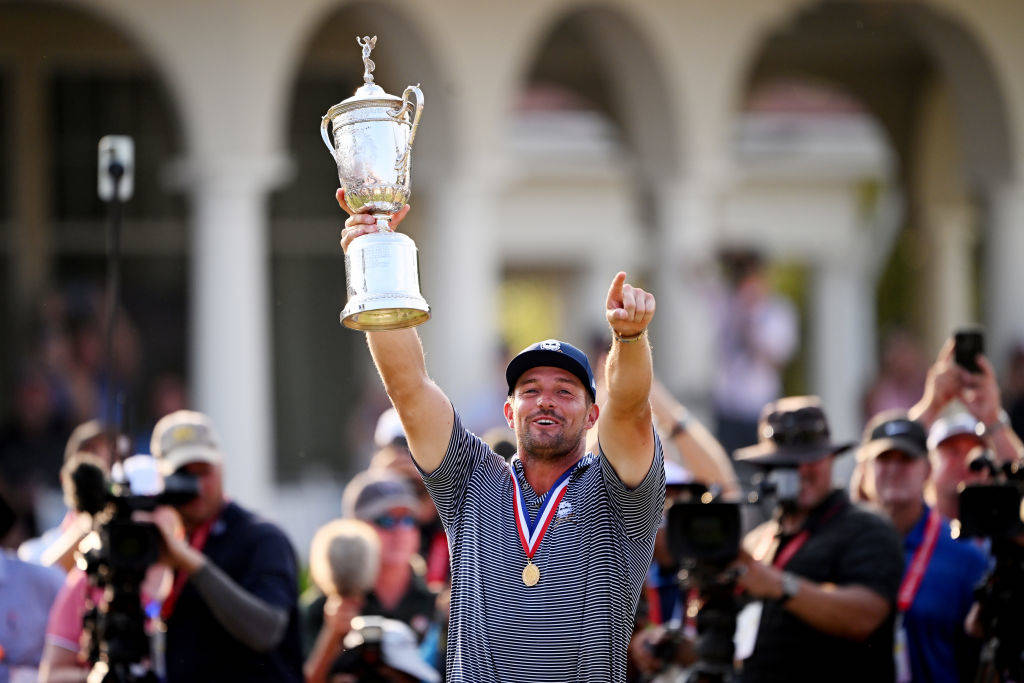 Bryson DeChambeau poses with the trophy after winning the 124th U.S. Open